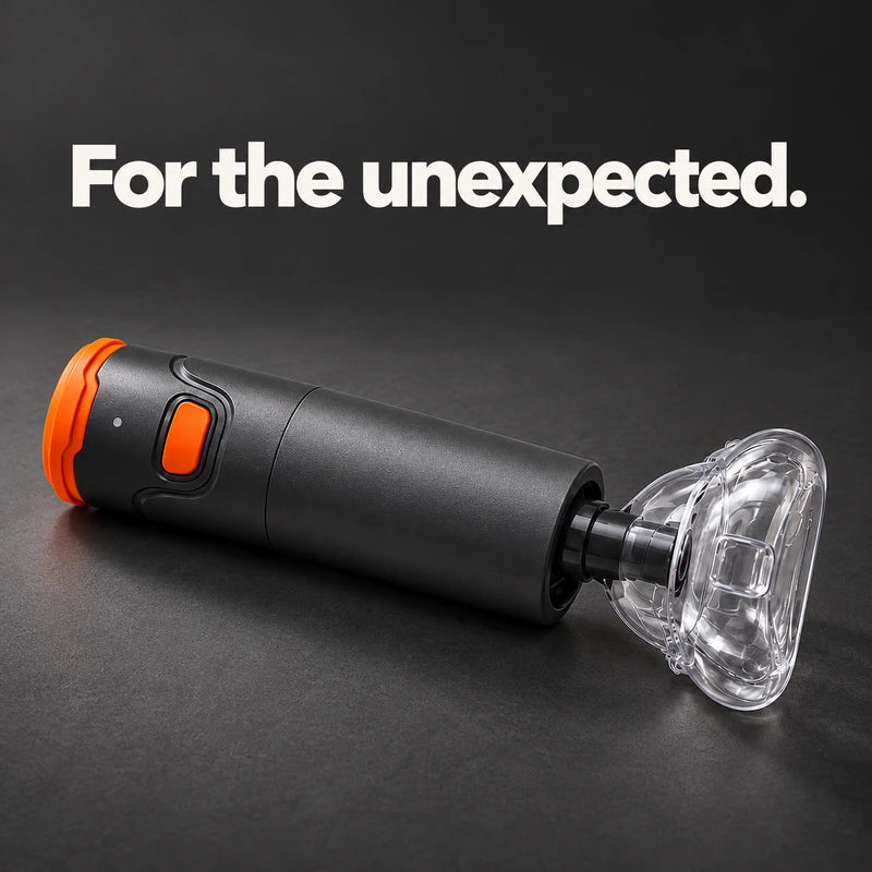Complete charcoal and orange device with its clear mask, photographed on charcoal beneath a simple off-white headline.